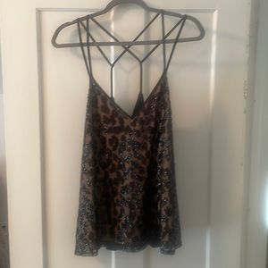 Express. Large dressy sequin top tan and black. Double strap. Fun back design!